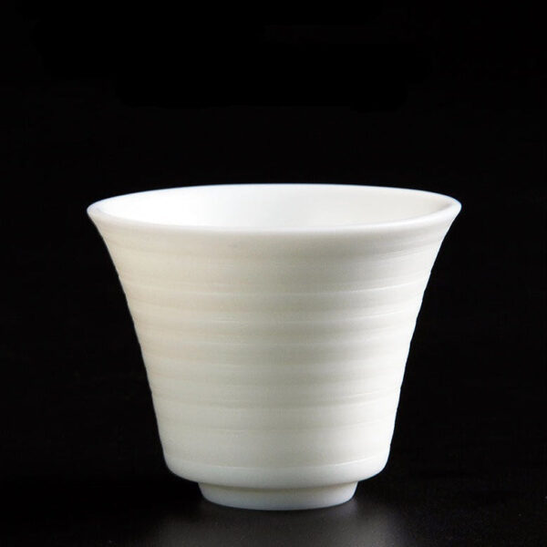 Mutton Fat Jade Porcelain "Bell-Shaped Spun" Tea Cup