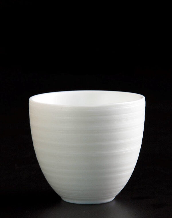 Mutton Fat Jade Porcelain "Egg-Shaped Spun" Tea Cup