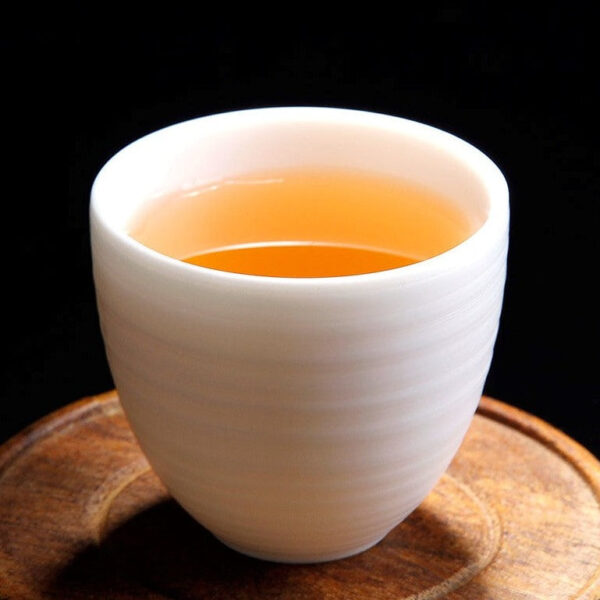 Mutton Fat Jade Porcelain "Egg-Shaped Spun" Tea Cup