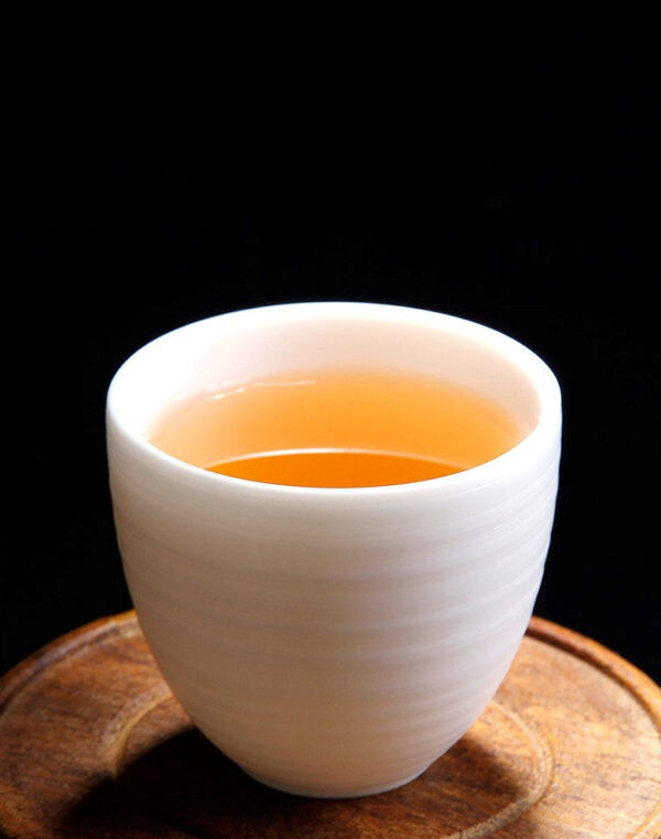 Mutton Fat Jade Porcelain "Egg-Shaped Spun" Tea Cup
