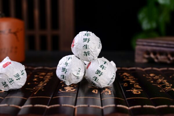 Yong De "Big Snow Mountain" Wild Purple White Tea Dragon Balls