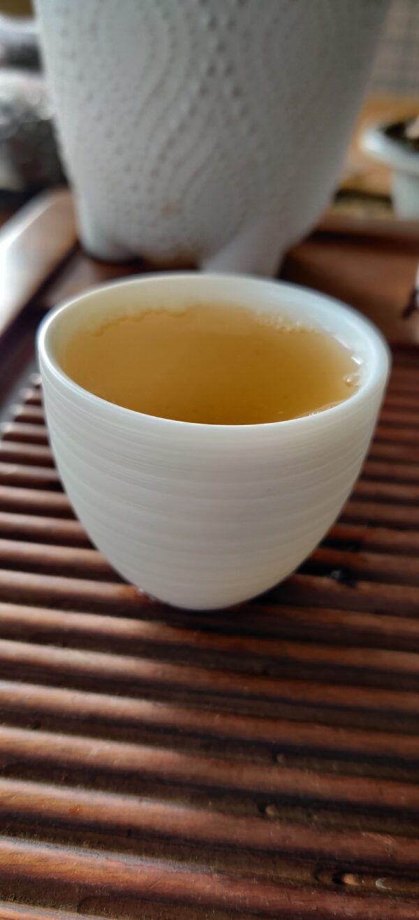 Mutton Fat Jade Porcelain "Egg-Shaped Spun" Tea Cup