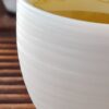 Mutton Fat Jade Porcelain "Egg-Shaped Spun" Tea Cup