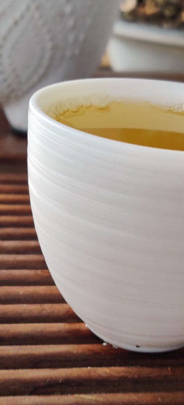 Mutton Fat Jade Porcelain "Egg-Shaped Spun" Tea Cup