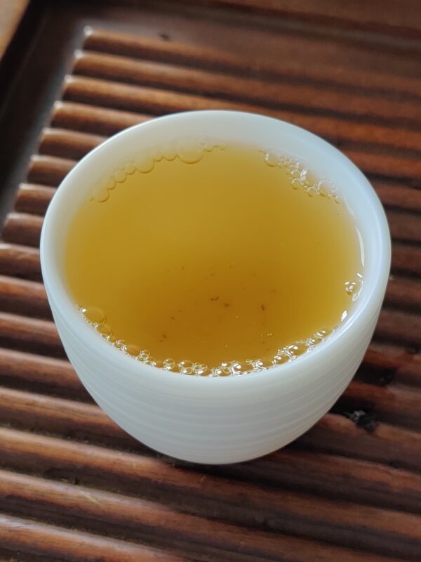 Mutton Fat Jade Porcelain "Egg-Shaped Spun" Tea Cup