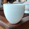 Mutton Fat Jade Porcelain "Egg-Shaped Spun" Tea Cup