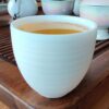 Mutton Fat Jade Porcelain "Egg-Shaped Spun" Tea Cup