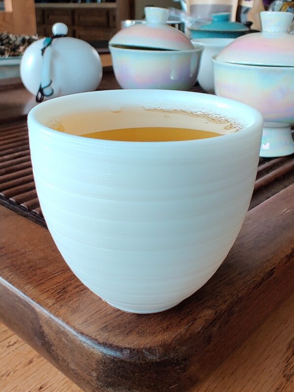 Mutton Fat Jade Porcelain "Egg-Shaped Spun" Tea Cup