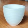 Mutton Fat Jade Porcelain "Egg-Shaped Spun" Tea Cup