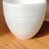 Mutton Fat Jade Porcelain "Egg-Shaped Spun" Tea Cup
