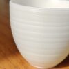 Mutton Fat Jade Porcelain "Egg-Shaped Spun" Tea Cup