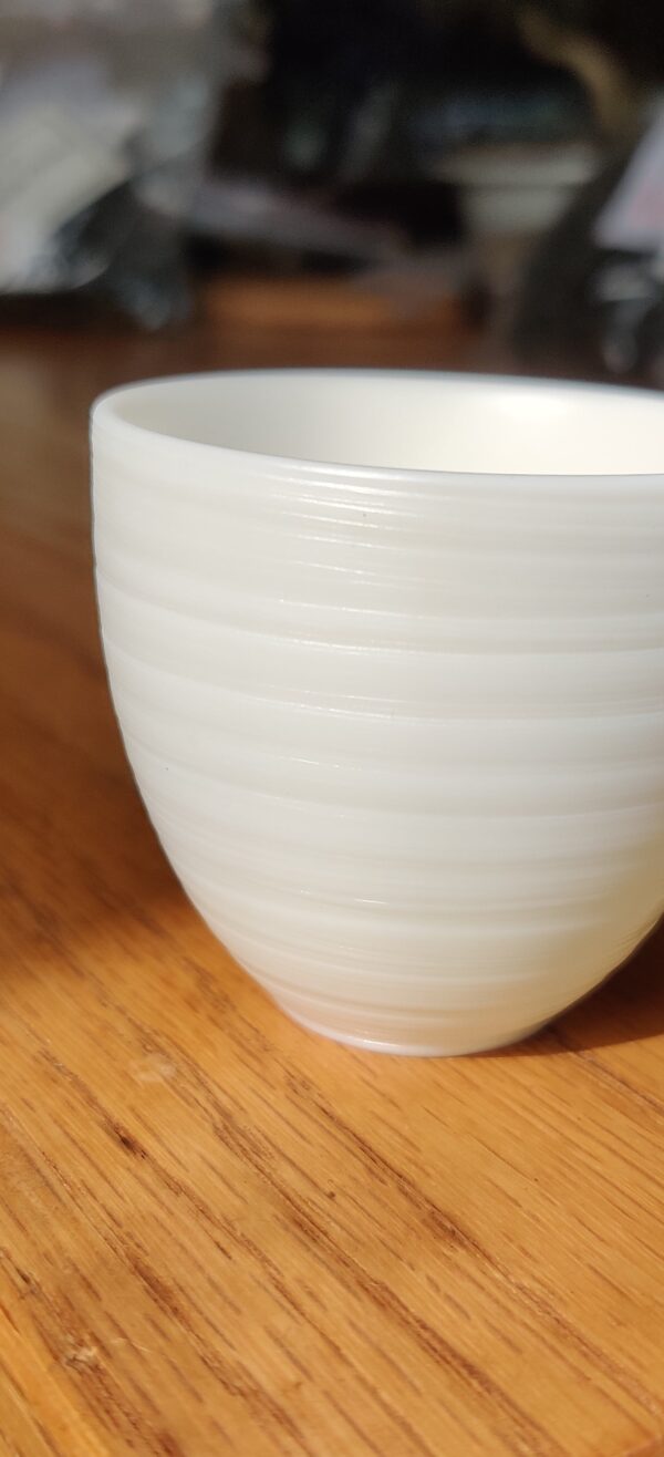 Mutton Fat Jade Porcelain "Egg-Shaped Spun" Tea Cup